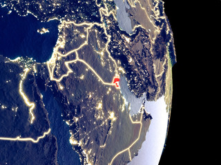 Satellite view of Kuwait at night with visible bright city lights. Extremely fine detail of the plastic planet surface.