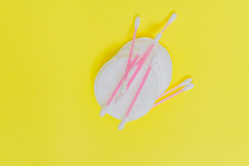 Cosmetic cotton pads and cotton sticks on white background. Make yp and skincare concept.