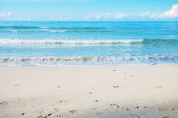 Fototapeta na wymiar Waves on sand beach.