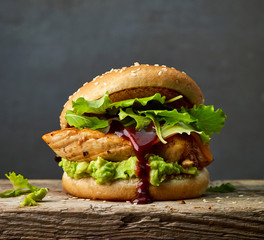burger with chicken meat and avocado