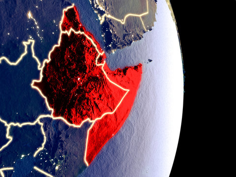 Satellite View Of Horn Of Africa At Night With Visible Bright City Lights. Extremely Fine Detail Of The Plastic Planet Surface.