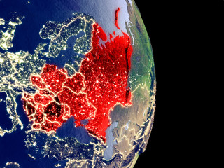 Satellite view of Eastern Europe at night with visible bright city lights. Extremely fine detail of the plastic planet surface.