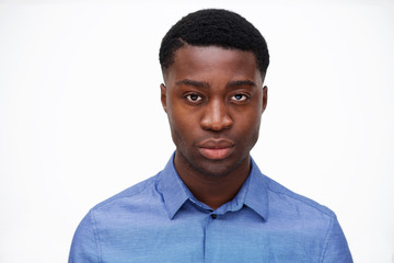 Close up handsome young black man against isolated white background