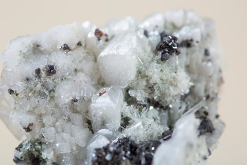 Pyrite on white background, also known as iron pyrite and fools gold