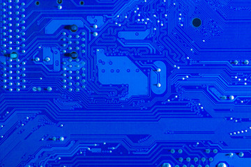 Macro close-up of blue circuit board