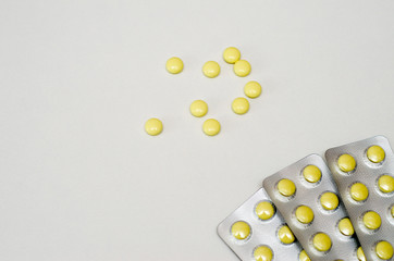 tablets painkiller prescribed by a doctor lie on a light background