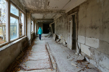 Obraz premium School corridor, dead abandoned ghost town Pripyat in exclusion zone of Chernobyl nuclear power plant, Ukraine