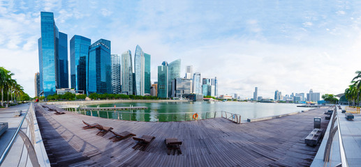 Hight modern building with relax chair in city, panorama view. Free space for text.