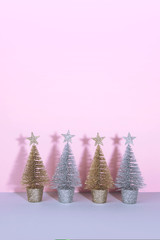 Christmas tree over pink background.