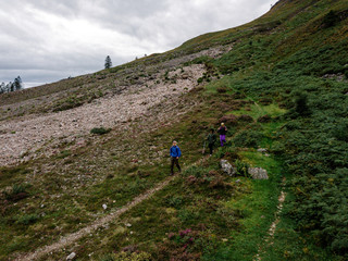 Fototapeta premium Group of friends trekking in Glen Etive, Scotland