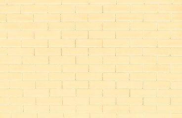 Obraz premium Yellow brick wall textured background