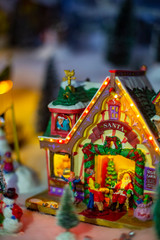 Naklejka premium Vintage Christmas santa holiday house glows in the dark tree toy decorations