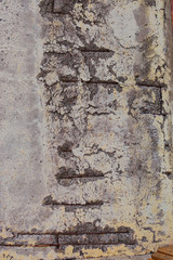 a crack in the concrete wall of the building