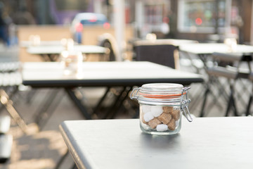 Outdoor area of coffee shop or restaurant, tables with copy space