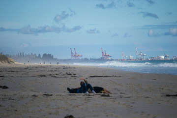 Landscape of a beach in north perth in a windy day full of waves water
