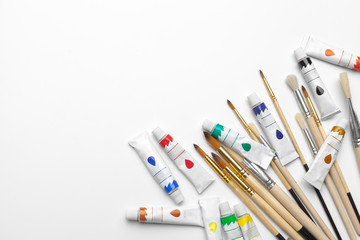 Art of Painting. Painting set: brushes, paints,  acrylic paint on a white background © NewFabrika