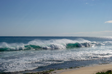 Landscape of a beach in a sunny and windy day