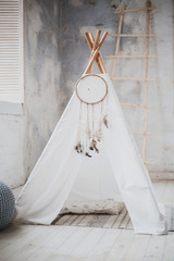 Wigwam in the children's room © OlgaOvcharenko