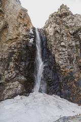 Fototapeta na wymiar waterfall mountain vertical
