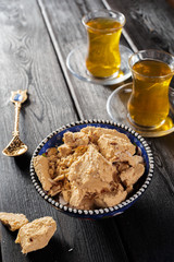 Tasty halva with tea on the table