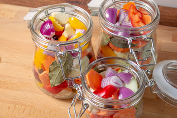 Marinated pickled vegetables in a glass jar