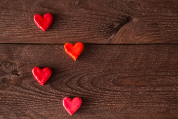 small hearts on a wooden background. Valentine's day concept.