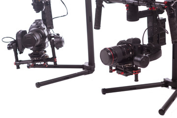 Systems stabilization video camera and lens on steady equipment support such as gimbal steady or stabilized. White background