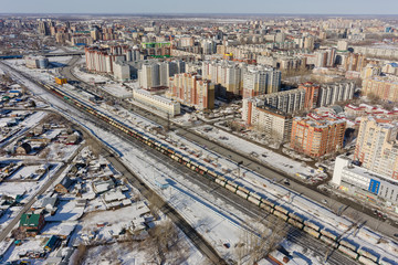 Fototapeta na wymiar Residential district near railway. Tyumen. Russia
