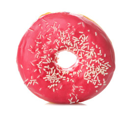 Sweet donut with icing and sprinkling of pink color close up on white isolated background