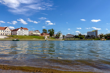 Fototapeta na wymiar Embankment of Svisloch River in the old district of Minsk. Belarus,