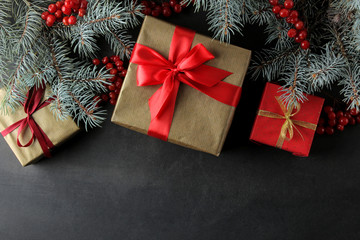 New Year. Christmas. Holidays. Frame of holiday gifts on a dark background. view from above. with space for text