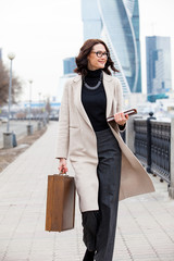 middle-aged woman in a bright coat