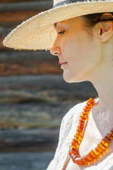 woman with an amber necklace