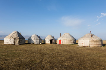 Fototapeta na wymiar A yurt settling in the Tian Shan mountains at Song Kul lake in Kyrgyzstan