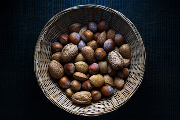 nuts, hazelnuts and almonds in a basket