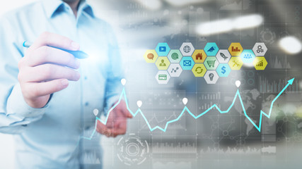 Mixed media, Business intelligence analytics. Icons, graphs and charts on virtual screen....