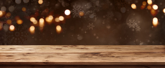 Wooden table with gold brown christmas background