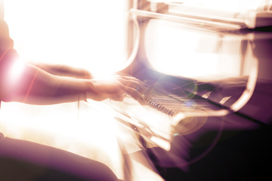 Close-up Musician Playing The Piano On The Stage