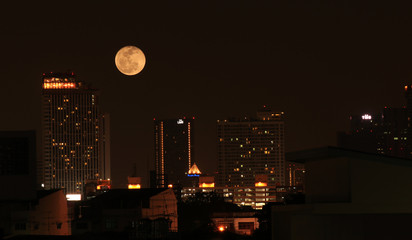 City bangkok and big moon at night