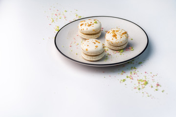 Three white macaroons