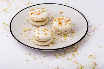 Three white macaroons