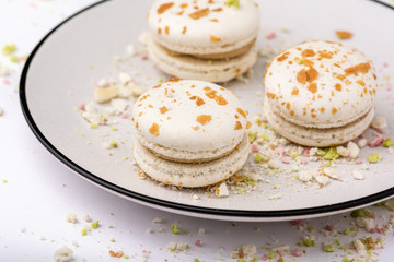 Three white macaroons