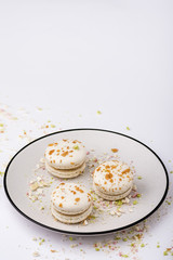 Three white macaroons