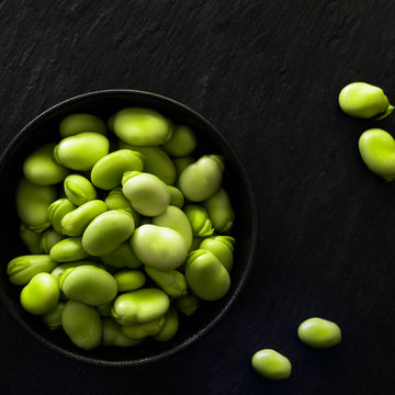 Close up of shelled broad beans in bowl