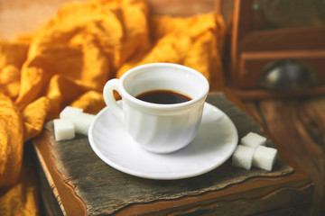 One cup  of coffee espresso near sugar cube
