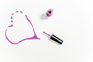 several paintbrushes with paint on a table