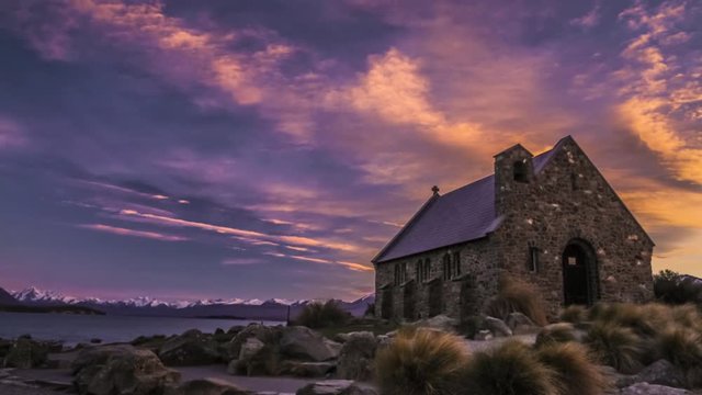 Timelapse video of the iconic church on the bank of beautiful Lake Tekapo just before the sunrise. One of the most visited places in New Zealand and major tourist attraction on the South Island.