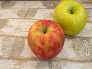 Two large apples red and green close up