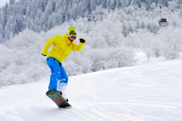 snowboarder on mountain slope