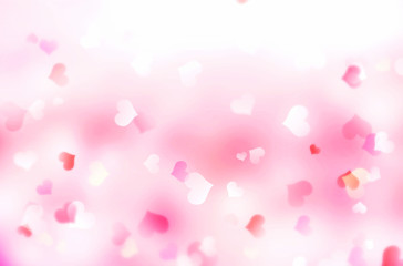 Valentine's day blurred hearts bokeh background.